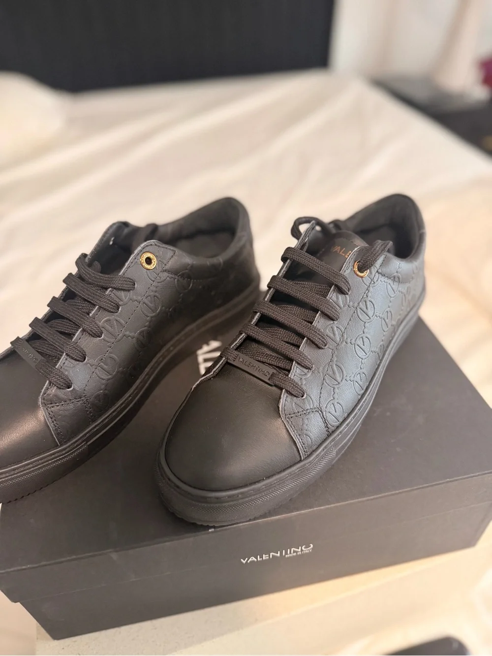 Valentino Men’s Black Leather Low-Top Sneakers with Gold Eyelets